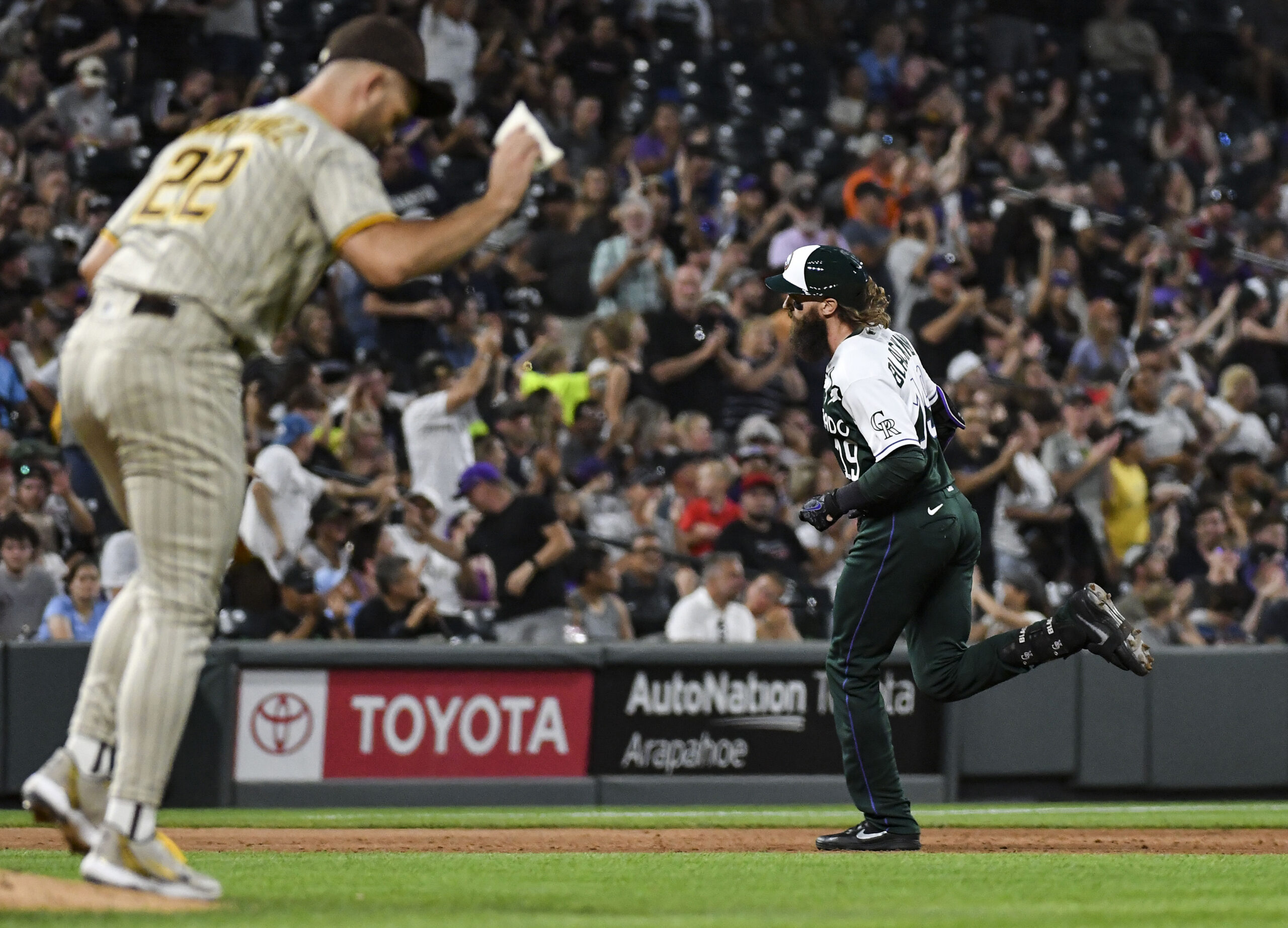 Padres take 2 of 3 at Coors Field